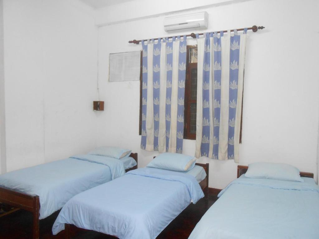 Saysouly Guesthouse Vientiane Ruang foto